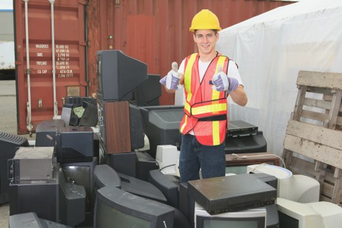 Professional team clearing furniture in a Wimbledon home