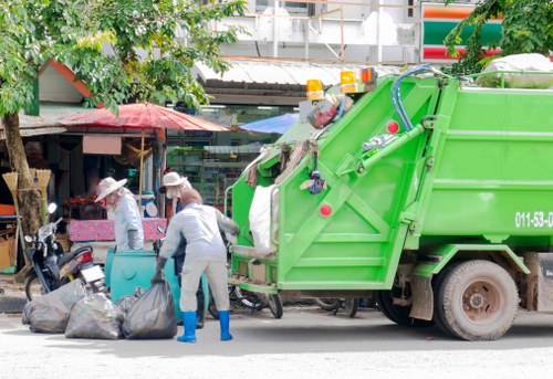 Workers sorting recyclable materials in a Wimbledon facility